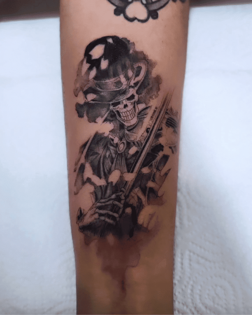 Classy Brook One Piece Tattoo