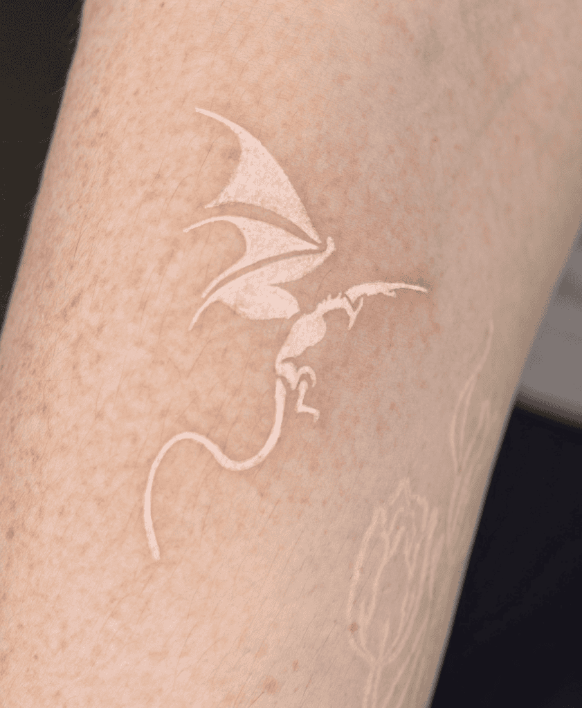 White Ink Dragon Tattoo