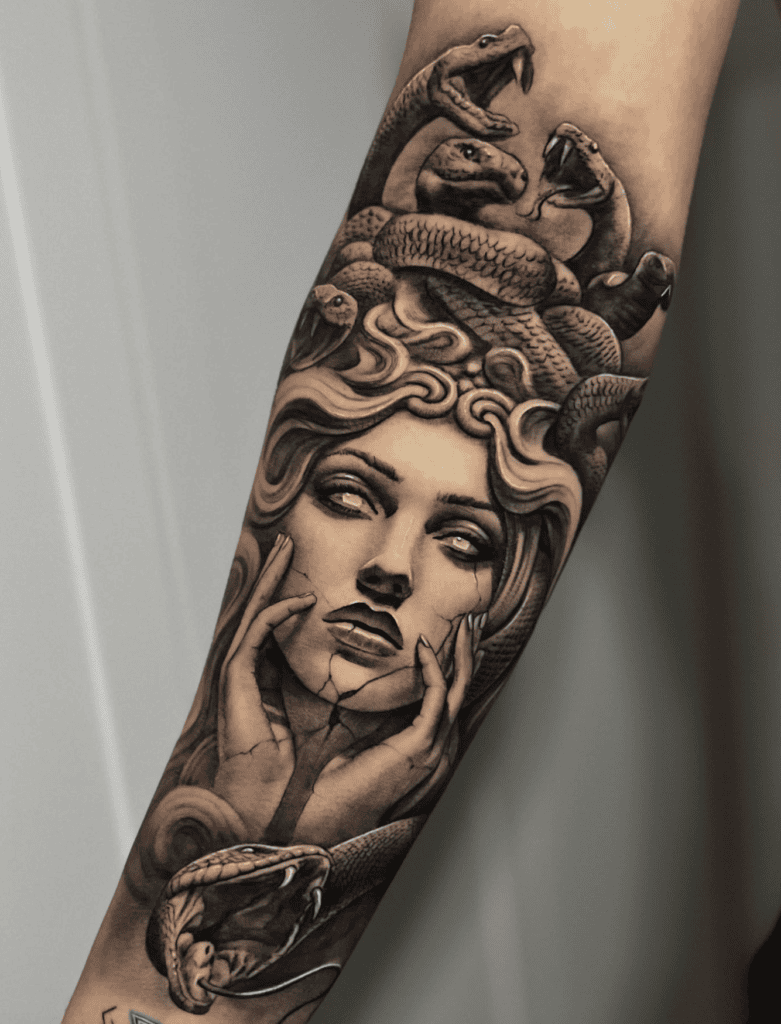 Medusa Statue Snake Tattoo