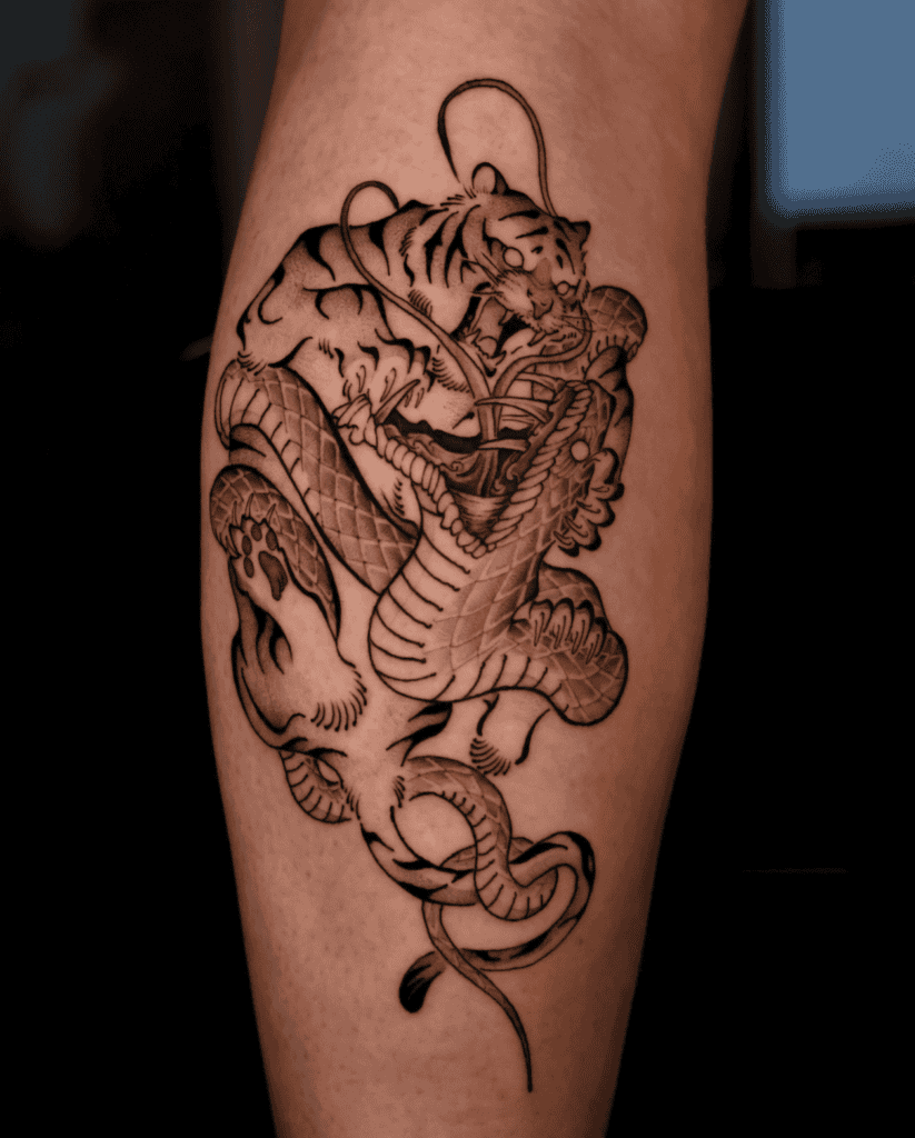 Tiger and Snake Battle Tattoo