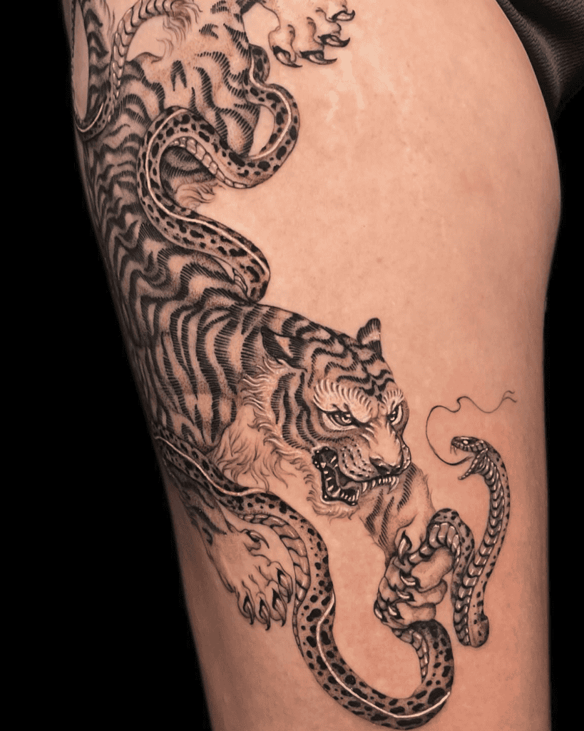 Tiger and Snake Grab Tattoo